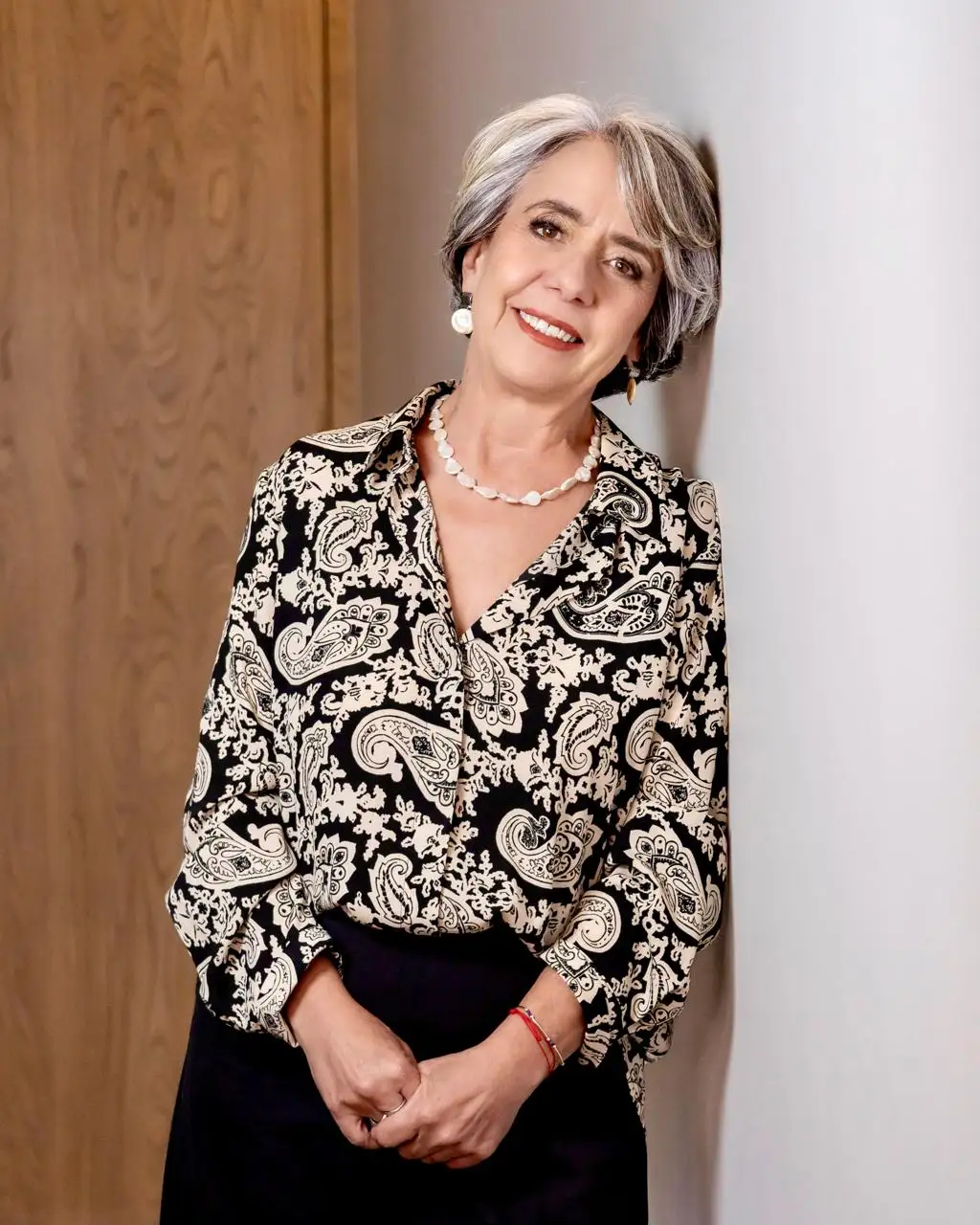 Retrato de María Poch, coach ejecutiva y experta en transformación organizacional